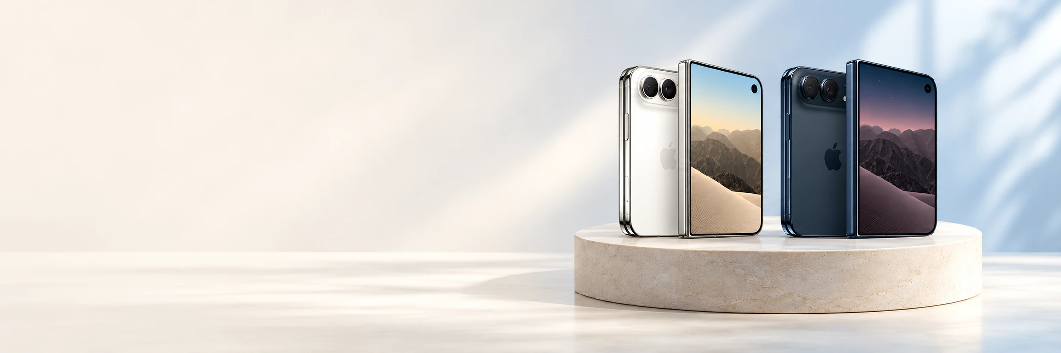 iPhone Duo en Star White y Night Sky, centrados sobre una base de piedra.